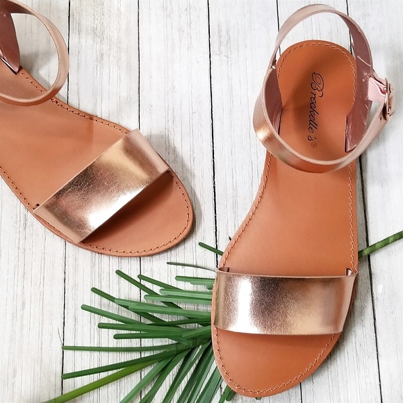gold flat sandals with ankle strap